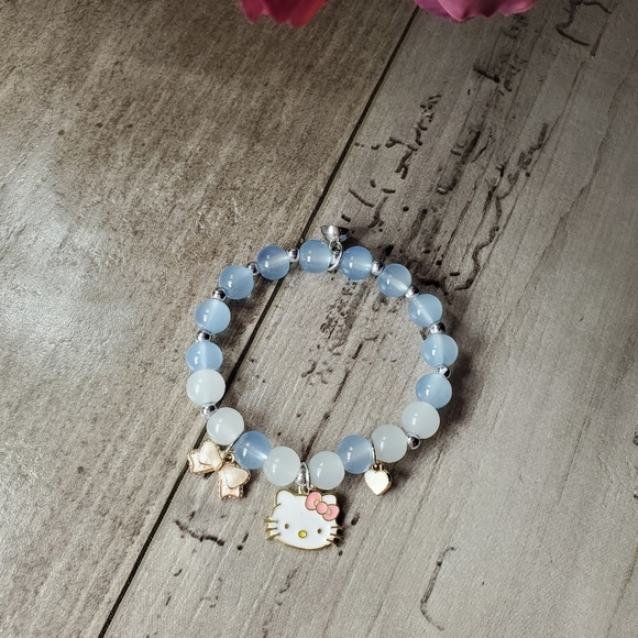 NWT Sanrio Hello Kitty Beaded Cartoon Bracelet Stretchy Blue Gray White - Picture 2 of 11